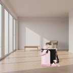 A light pink insulated water bottle with a pink carry strap and black carabiner, shown with a black mesh carrying case, two white straws, a pink flip-straw lid, and a cleaning brush on a white background. A vertical row of smaller bottle color options appears along the left edge.