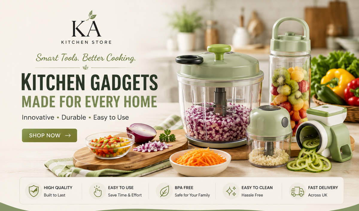 KA Kitchen Store promotional banner showcasing a green and clear kitchen gadget set on a wooden countertop, including a manual food chopper, a tall juicer bottle, and a small grinder, surrounded by fresh vegetables and a kitchen background.
